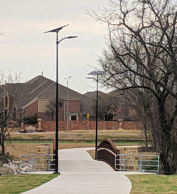 Shows solar lighting next to trail