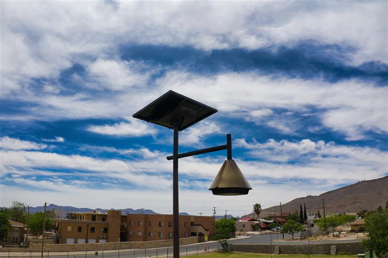 opera-solar-street-light OPERA decorative solar street light with suspended lantern design in a public outdoor space