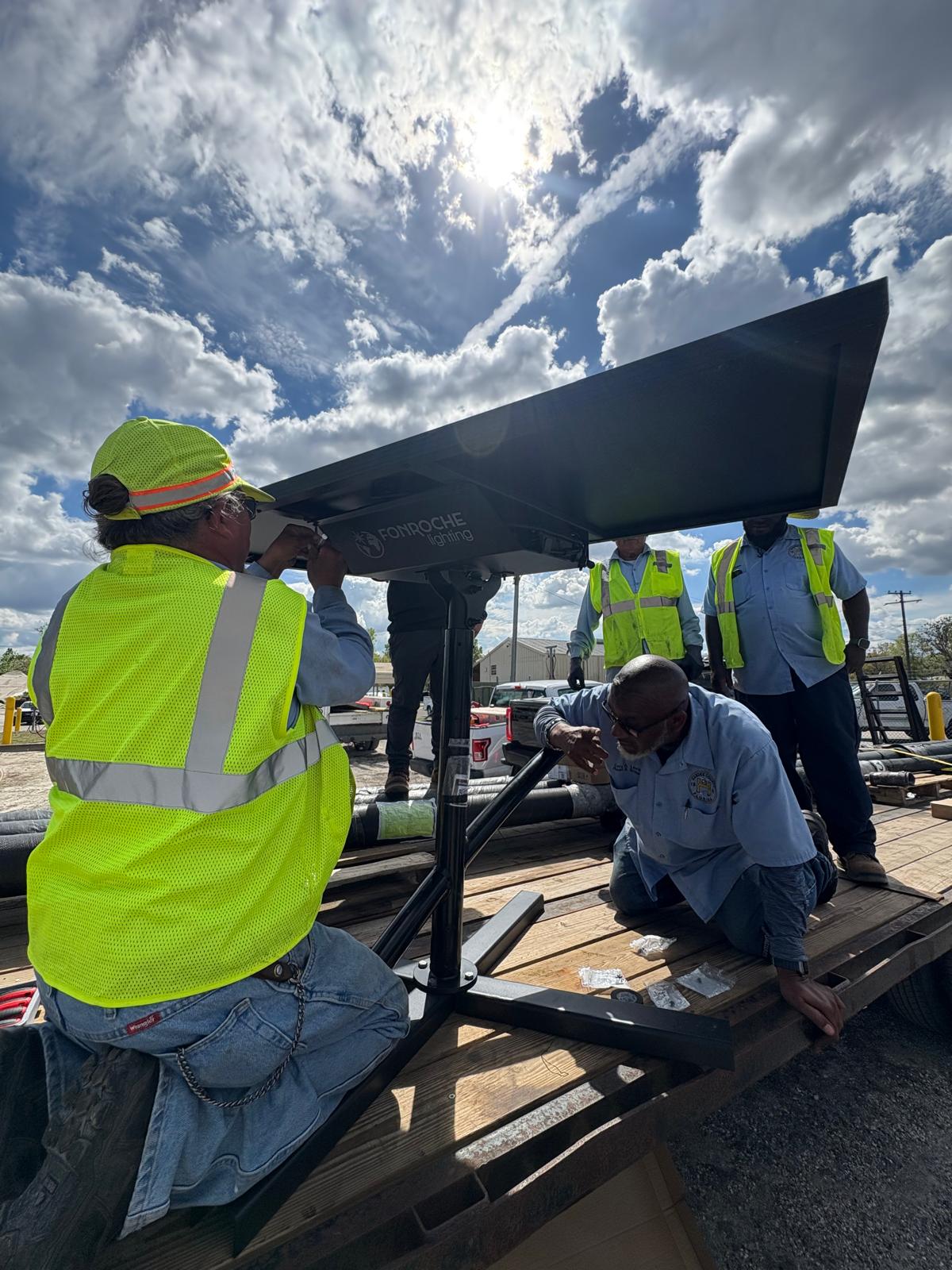 hardee county public works team installing fonroche solar lighting system
