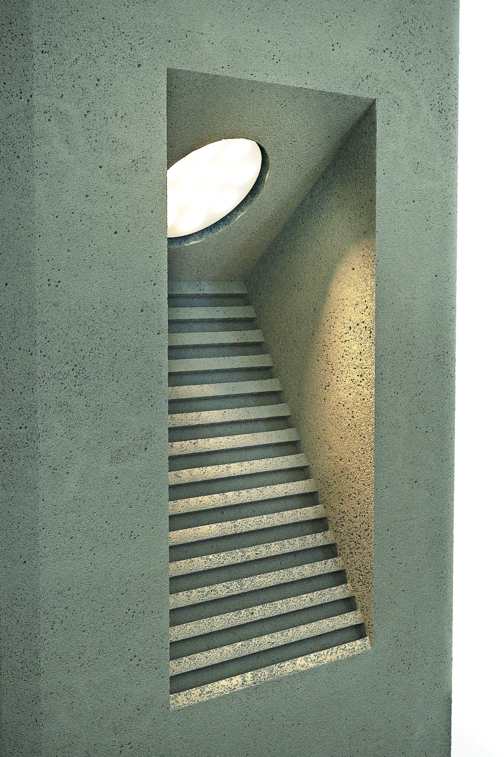 Close-up detail of an architectural solar bollard light featuring integrated LED optics and louvered illumination design.