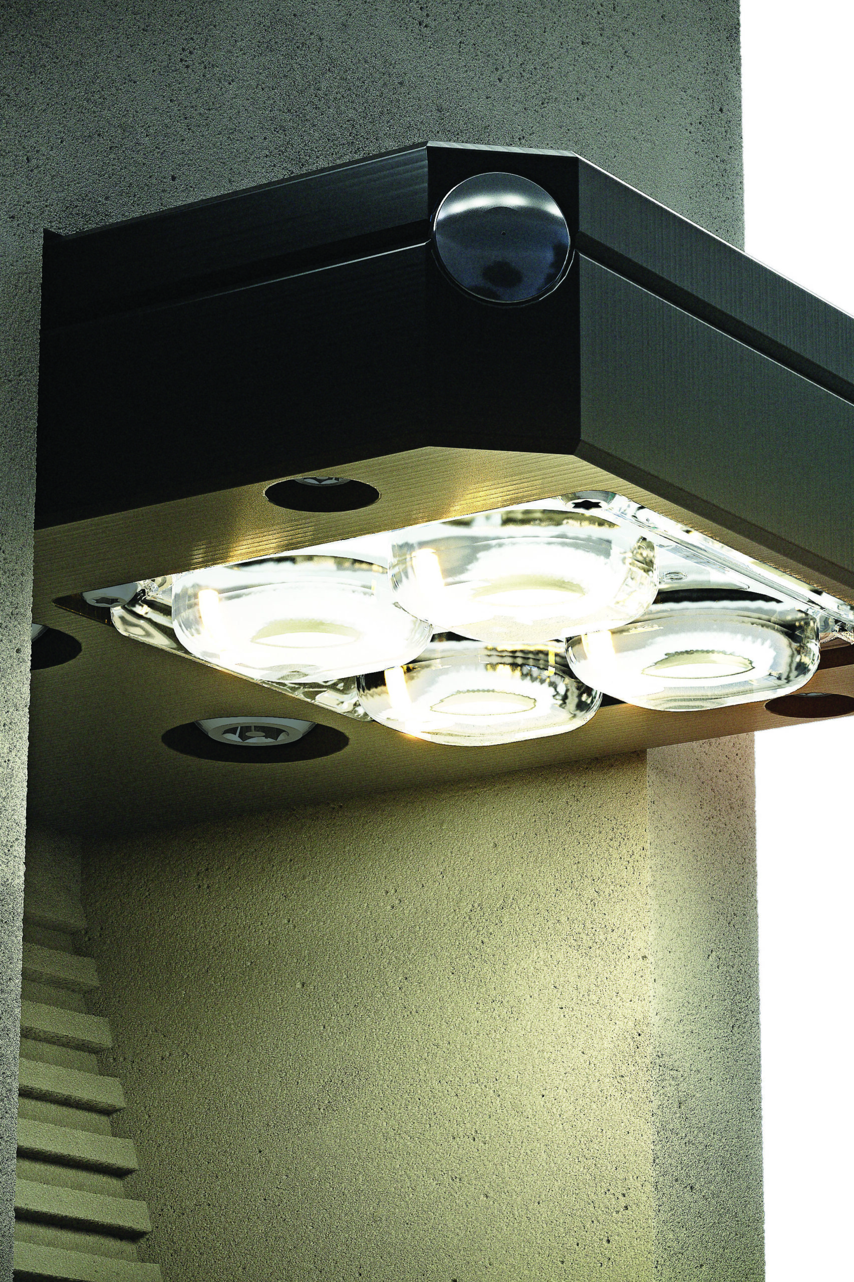 Close-up view of the LED optics integrated into an architectural solar bollard lighting fixture.