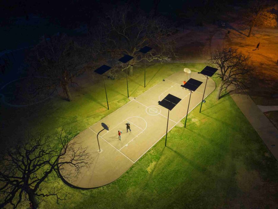 South Carolina basketball court illuminated by off-grid solar-powered streetlights, ensuring safety and visibility during nighttime and power outages.