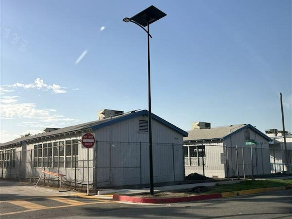 Solar-powered streetlight installed in a California community, providing grid-free, maintenance-free lighting