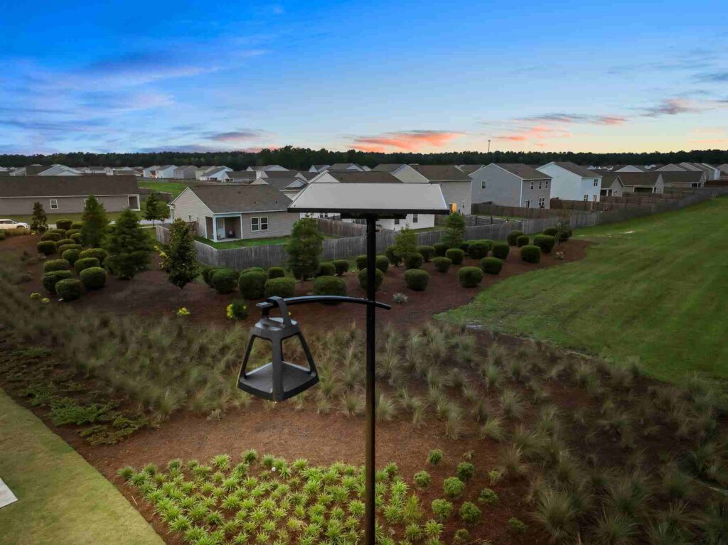 olar-powered streetlight providing reliable lighting in a residential neighborhood, enhancing safety and resilience during outages