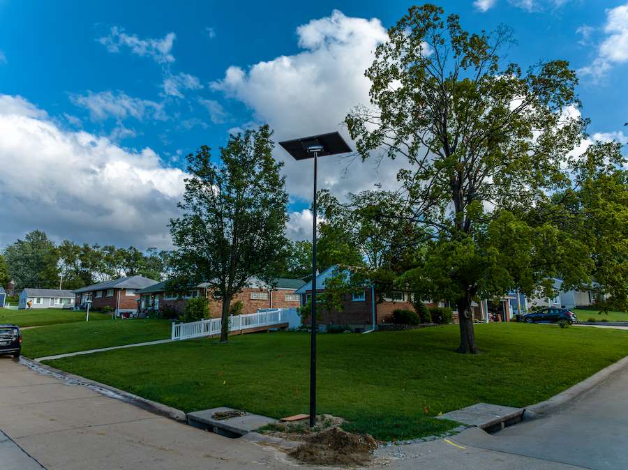 A solar-powered streetlight installed in a quiet Alabama neighborhood, enhancing nighttime safety without trenching or grid dependency.