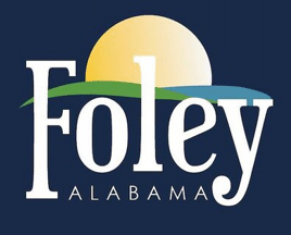 City of Foley Alabama logo featuring stylized sun over landscape with city name text on dark background