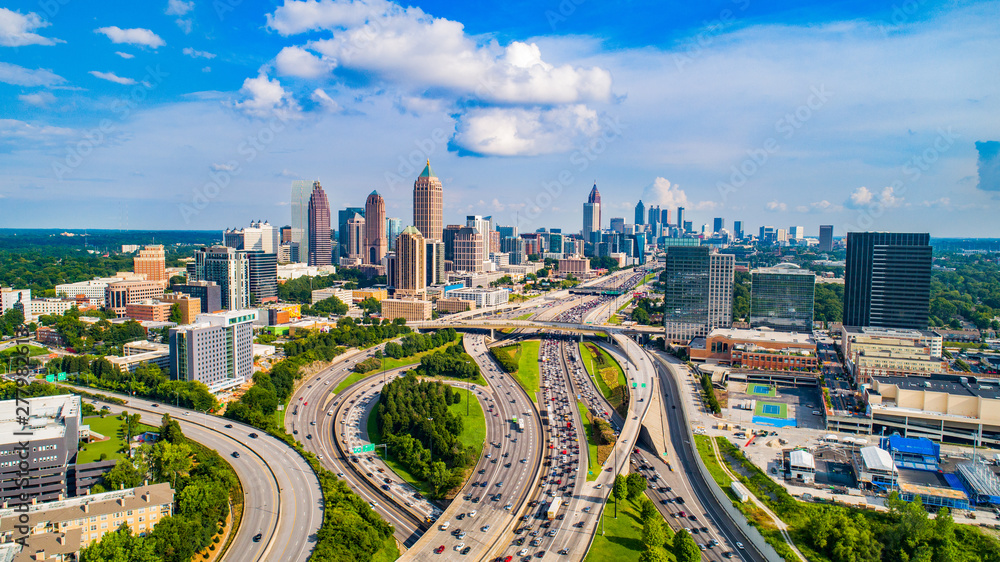atlanta-georgia-downtown-skyline-highway-interchange-urban-infrastructure Aerial view of downtown Atlanta, Georgia with major highways and urban infrastructure representing scalable solar street lighting applications.