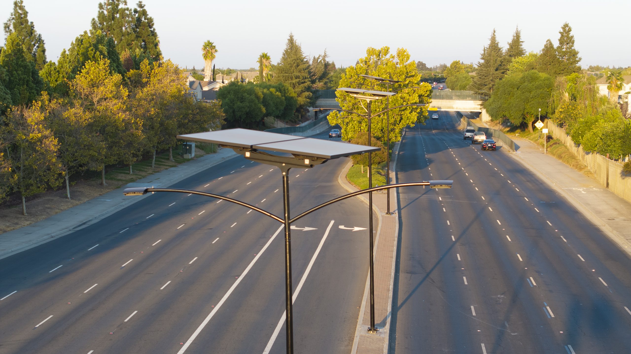 essential-solar-street-lights-road-street ESSENTIAL solar street lights illuminating a multi-lane roadway with reliable off-grid lighting.