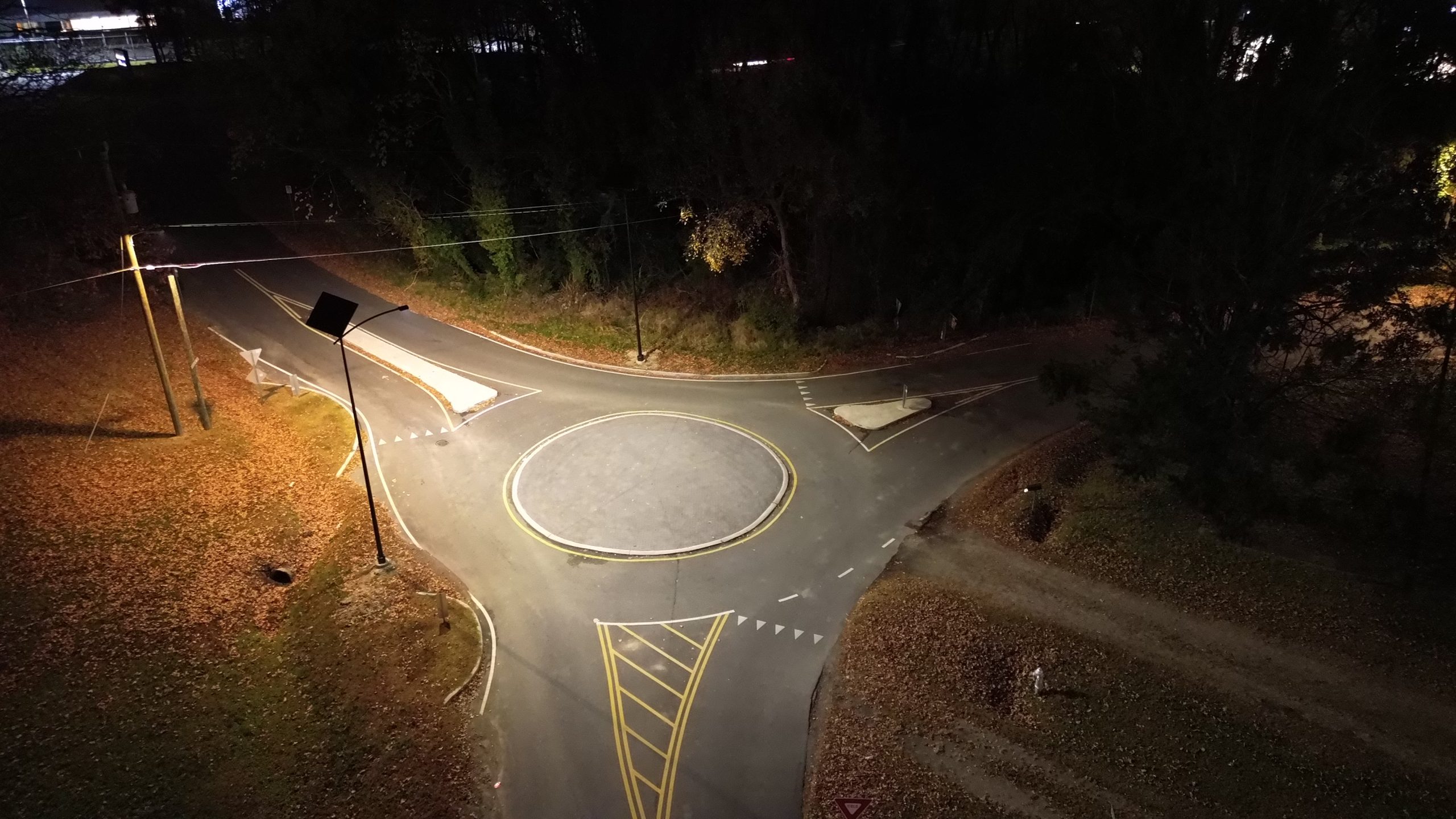 DCIM100MEDIADJI_0077.JPG Networked solar street lighting illuminating an Alabama roundabout at night, with remote monitoring and control through Fonroche Connect.