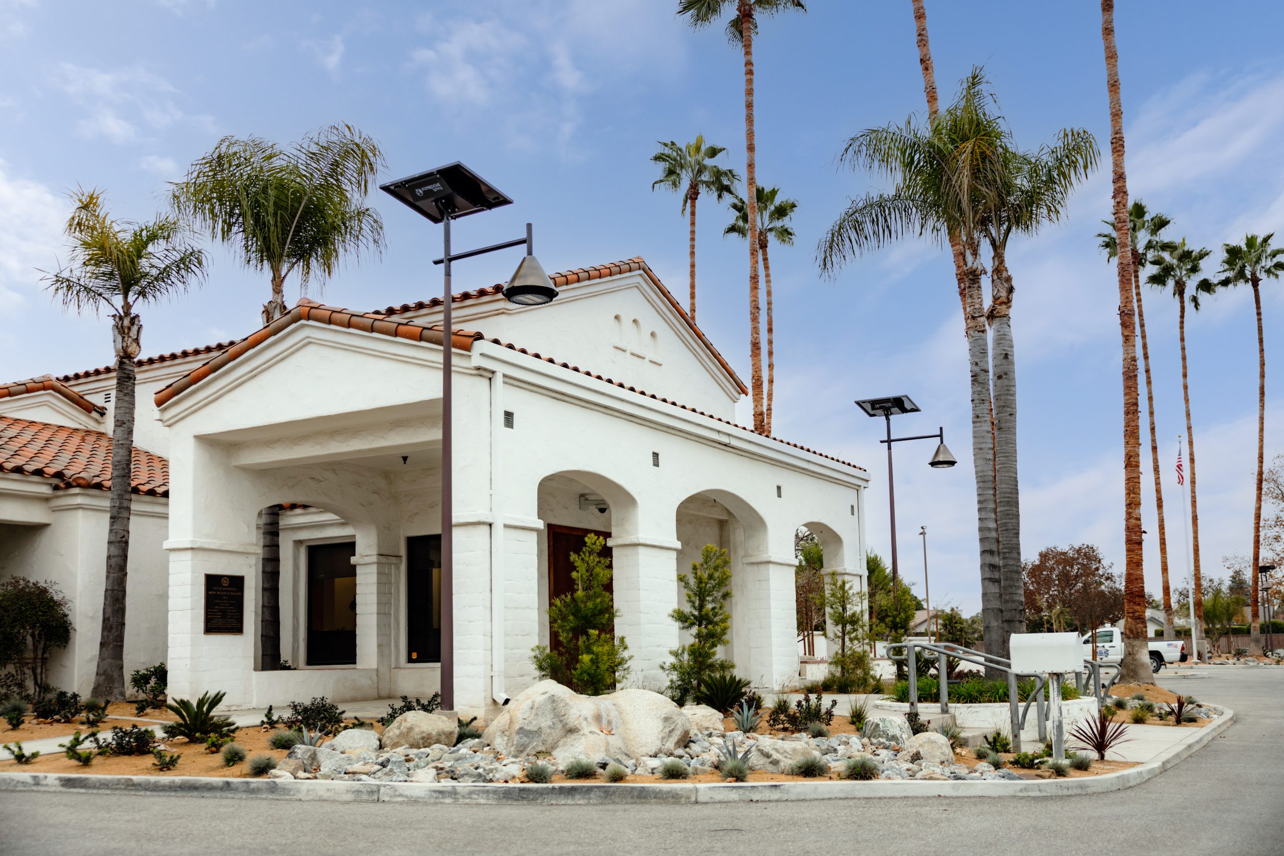 solar-lighting-restaurant-outdoor-entrance.jpg Off-grid solar lighting installed outside a restaurant and outdoor dining space with illuminated walkways, parking access, and palm-lined landscaping.