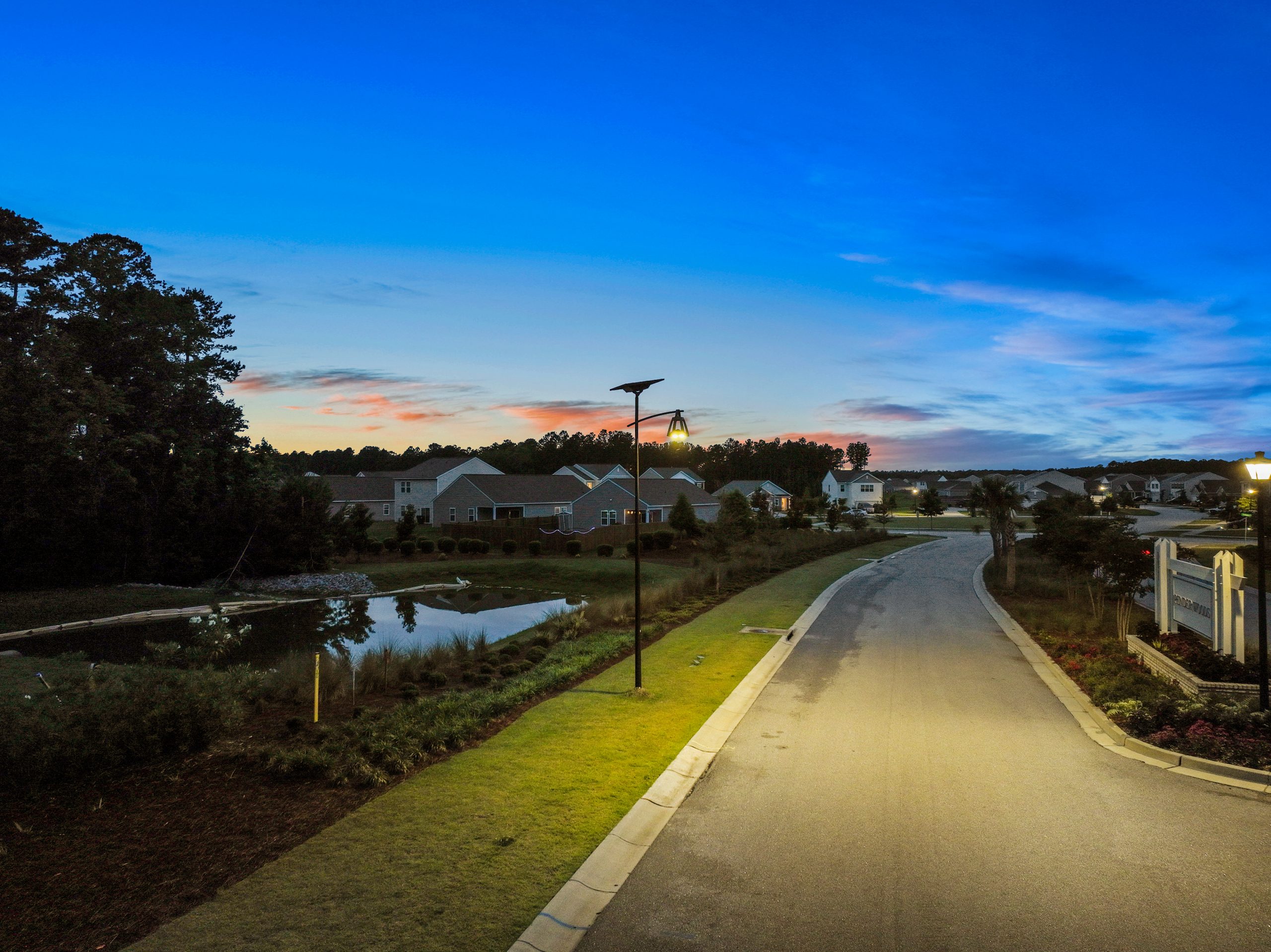 fonroche-connect-belle-epoque-residential Residential neighborhood illuminated by smart solar street lights with remote monitoring and adaptive lighting control capabilities.