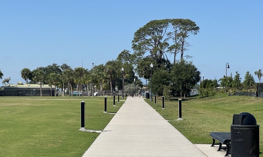 brut-bollards-along-pathway Solar pathway lighting installed in a public park and walking trail area