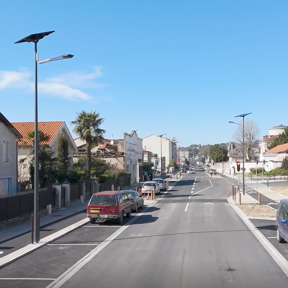 NEW ART solar streetlights illuminating a modern urban roadway with sleek architectural lighting designed for streets, residential neighborhoods, and public roadways.