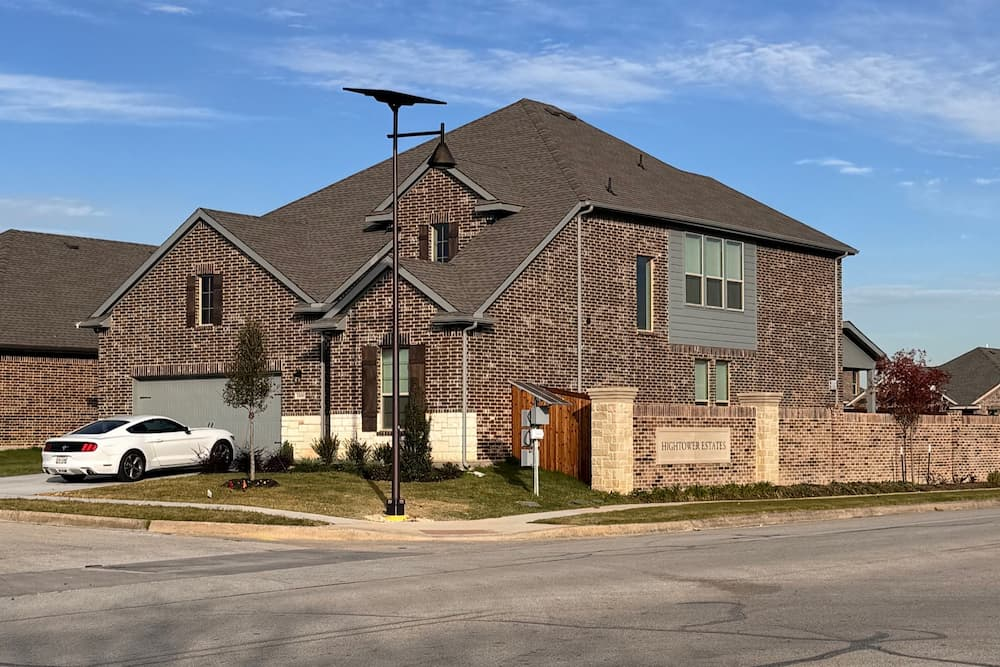 opera-solar-smartlights-road-street-residential Solar LED streetlights installed in a suburban residential neighborhood