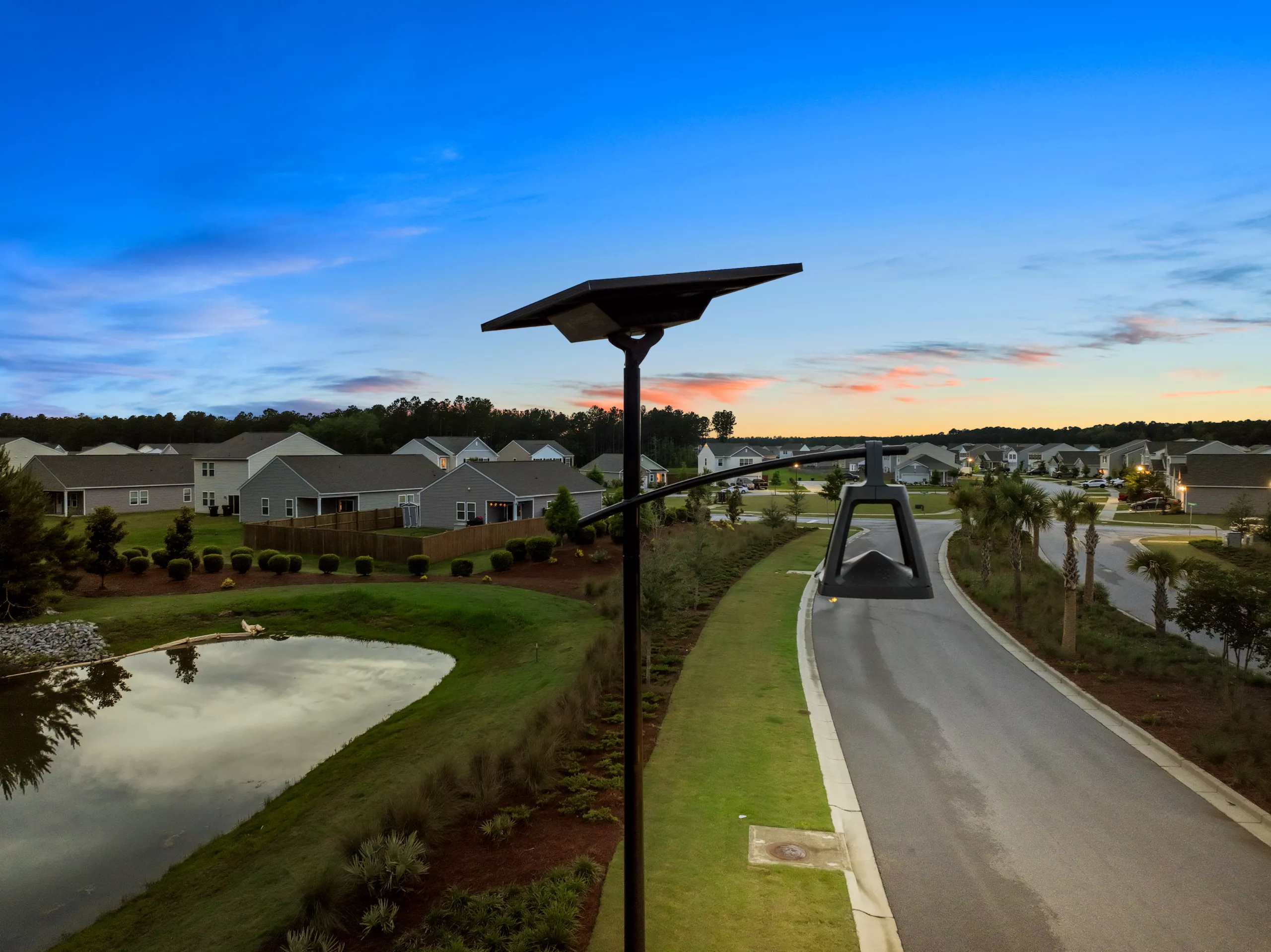 default Off-grid solar street light installed along a roadway in a South Carolina community.
