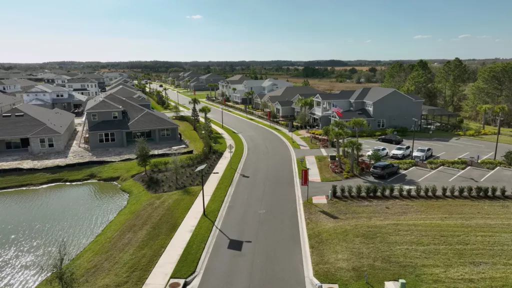 Off-grid solar lighting along a roadway and parking area in a planned development