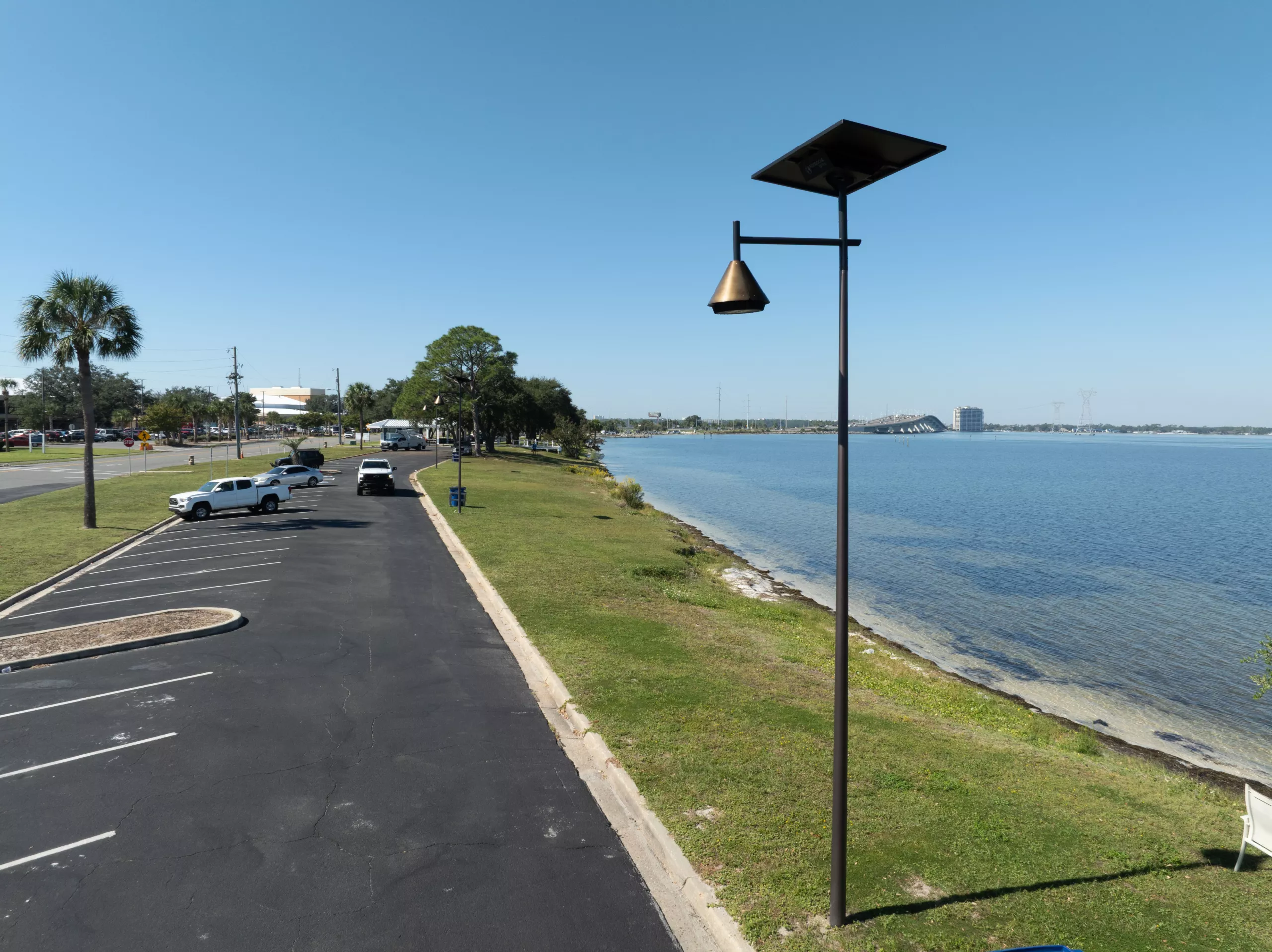 Solar street lighting installed along a Florida waterfront parking area